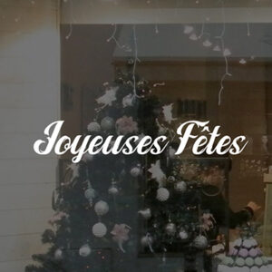 Décoration texte "Joyeuses Fêtes" en vitrophanie pour vitrine